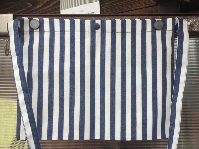 �}�j���[�i�@�I���W�i�� Heart Beat manana logo�̃T�R�b�V���A�o�b�N