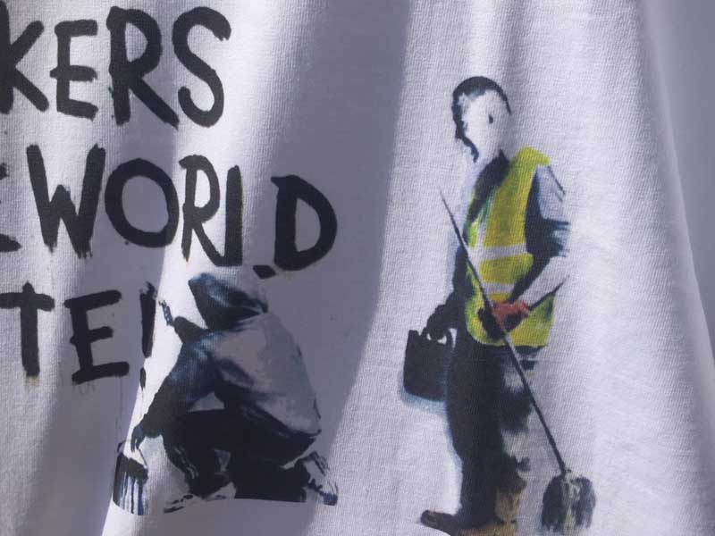 新品物 Banksy バンクシー　ステンシルアート　グラフィティーTシャツ from UK Workers Of The World Unite S/S Tee